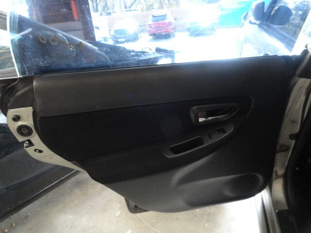 2005 Subaru WRX driver side rear door panel