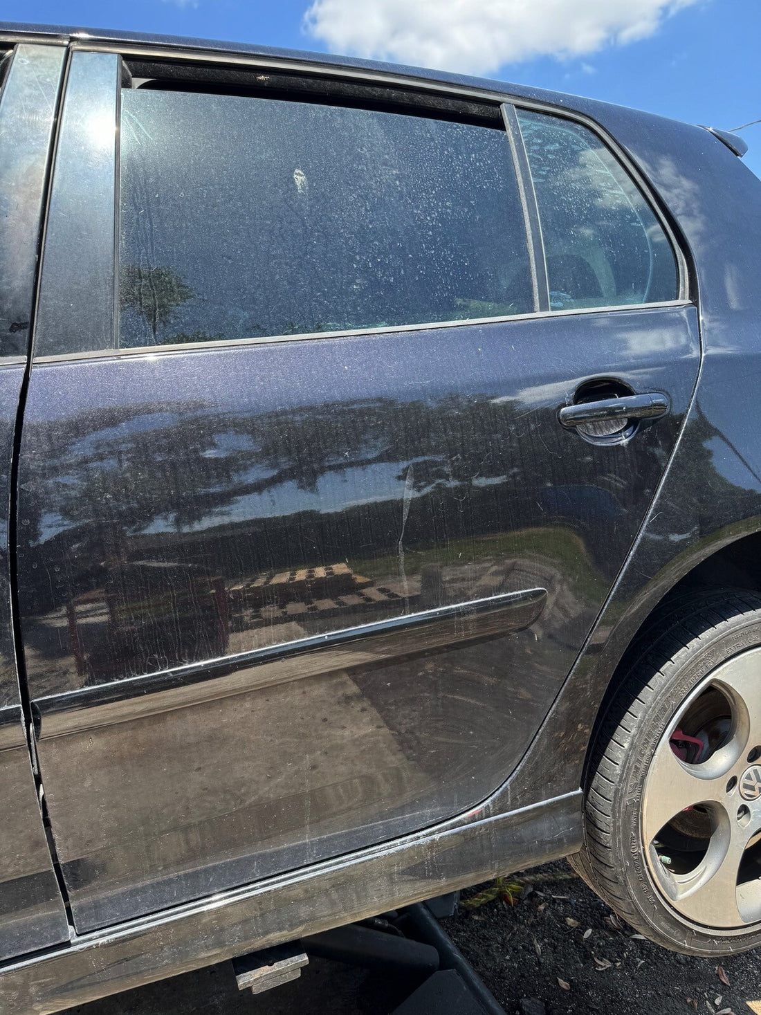 2006-2007 VW GTI rear DRIVER door. No panel, glass or regulator 