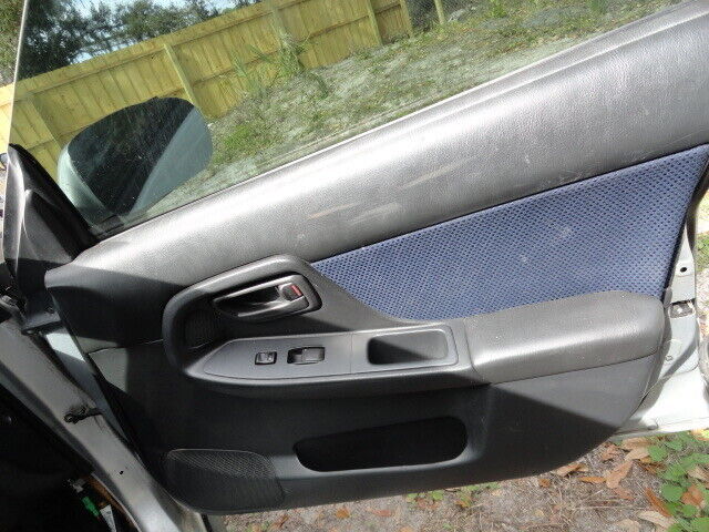 2003 Subaru WRX Passenger Side Interior Door Panel image 0